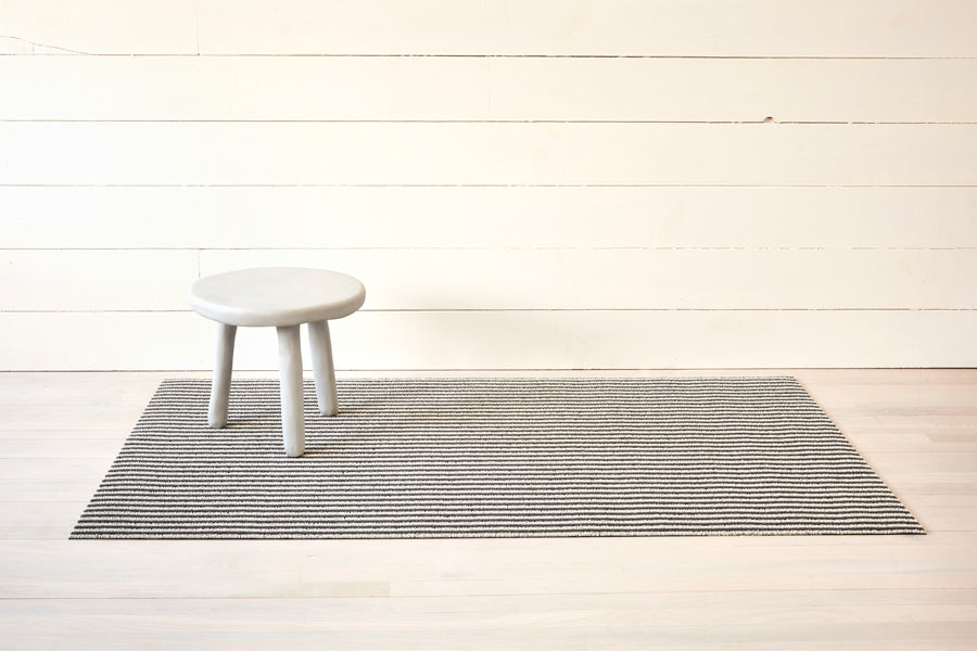 Breton Stripe Shag Floor Mat by Chilewich, showing breton stripe shag floor mat in live shot.