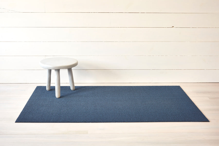 Breton Stripe Shag Floor Mat by Chilewich, showing breton stripe shag floor mat in live shot.