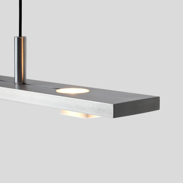 Brevis LED Linear Pendant by Cerno, showing closeup view of brevis led linear pendant in live shot.