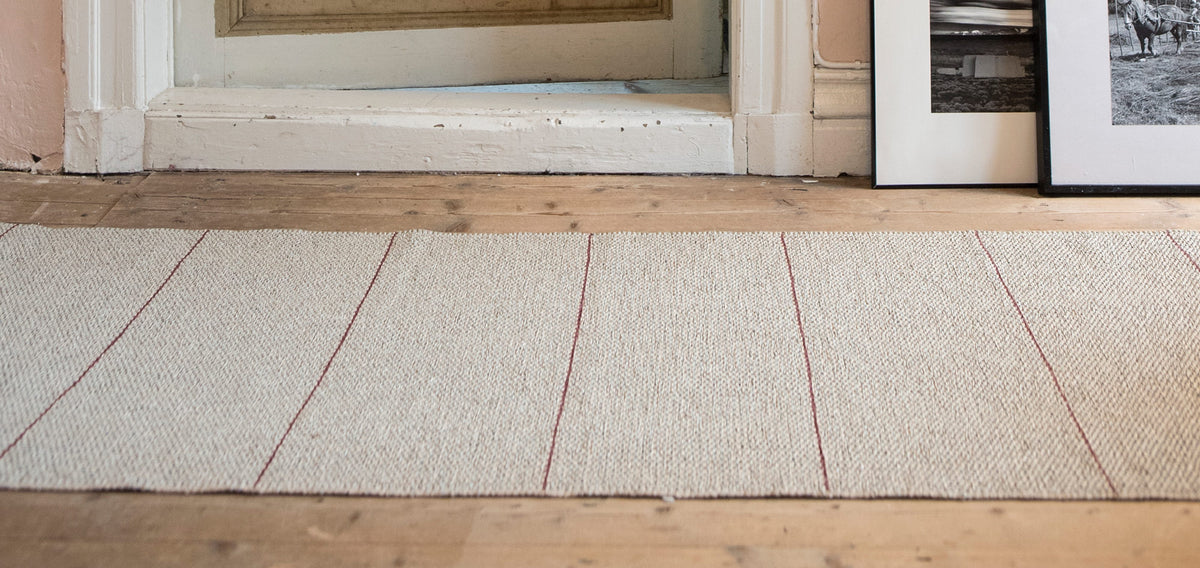 Brielle Woven Plastic Rug by Brita, showing brielle woven plastic rug in live shot.