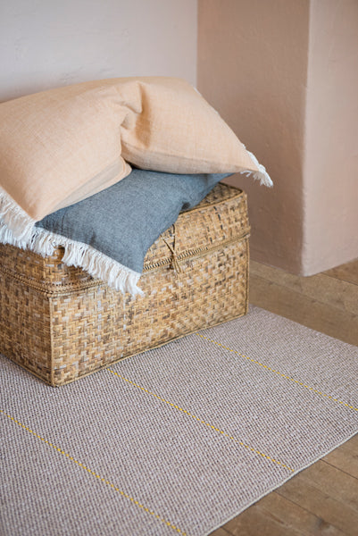 Brielle Woven Plastic Rug by Brita, showing closeup view of brielle woven plastic rug in live shot.