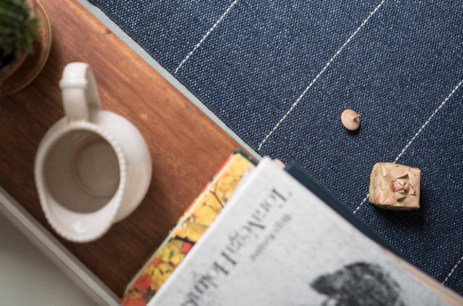 Brielle Woven Plastic Rug by Brita, showing closeup view of brielle woven plastic rug in live shot.
