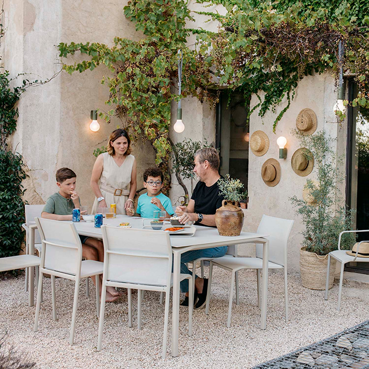 Cadiz Armchair (Set of 4) by Fermob, showing cadiz armchair (set of 4) in live shot.