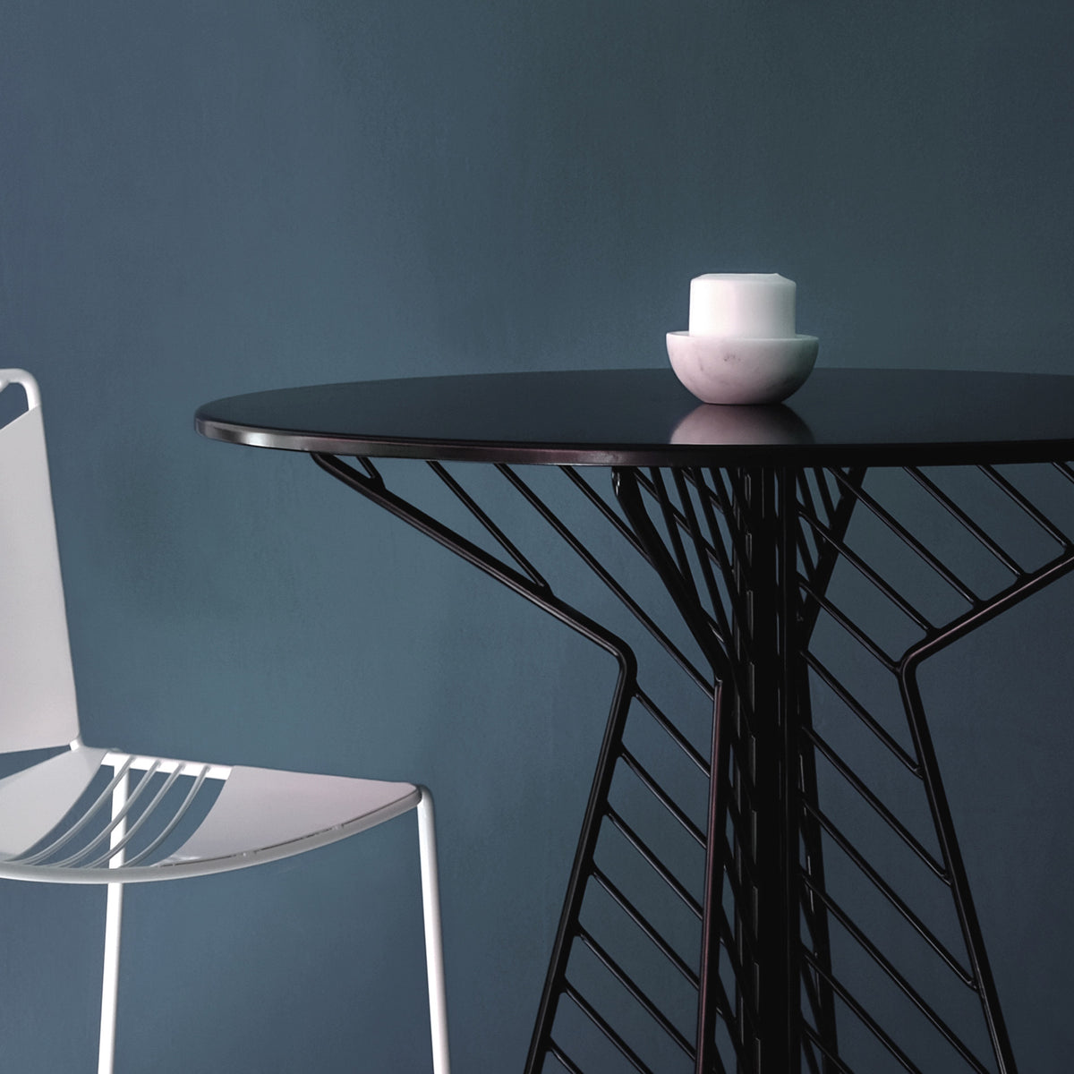 Cafe Round Bar Table by Bend, showing cafe round bar table with chair in live shot.