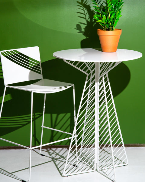 Cafe Round Bar Table by Bend, showing cafe round bar table with chair in live shot.