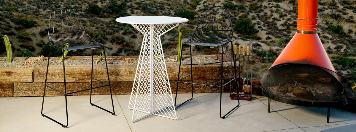 Cafe Round Bar Table by Bend, showing cafe round bar table with chairs in live shot.