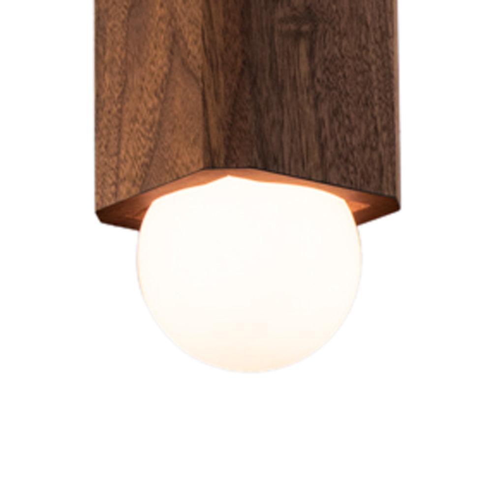 Cano Pendant by Cerno, showing detail view of cano pendant in walnut wood.