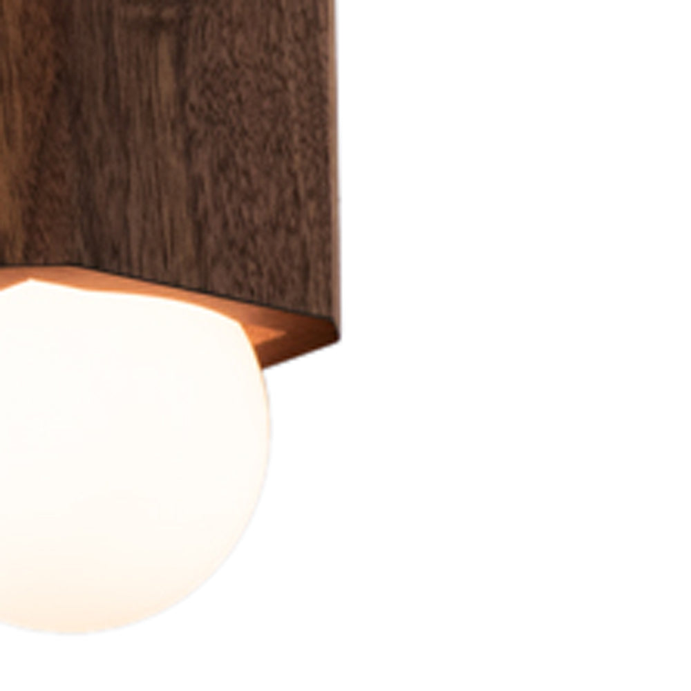 Cano Pendant by Cerno, showing detail view of cano pendant in walnut wood.