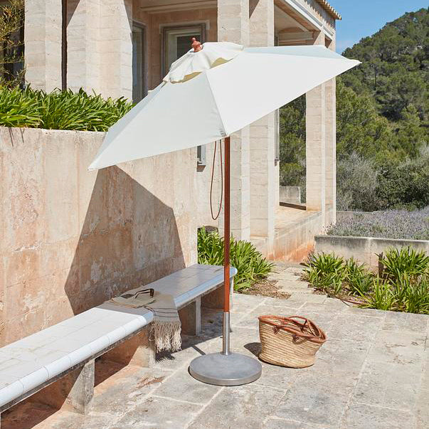 Capri Outdoor Umbrella Foot by Skagerak, showing capri outoor umbrella foot in live shot.