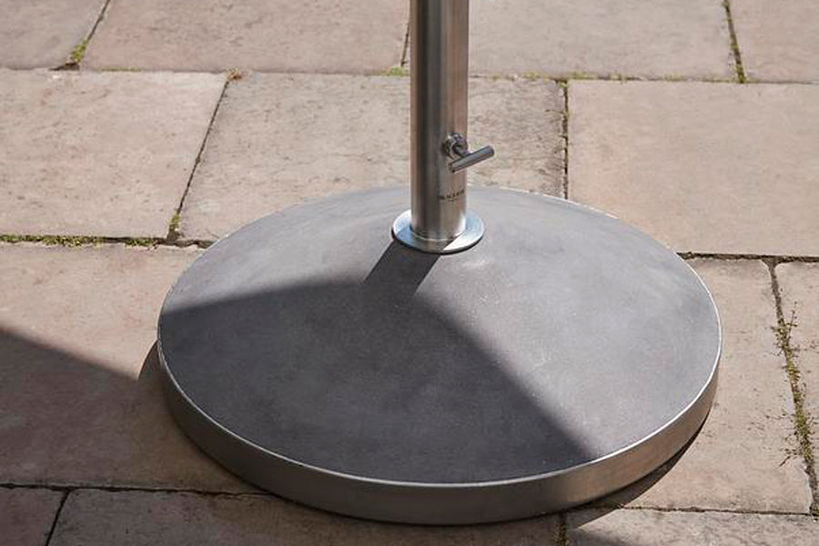 Capri Outdoor Umbrella Foot by Skagerak, showing capri outoor umbrella foot in live shot.