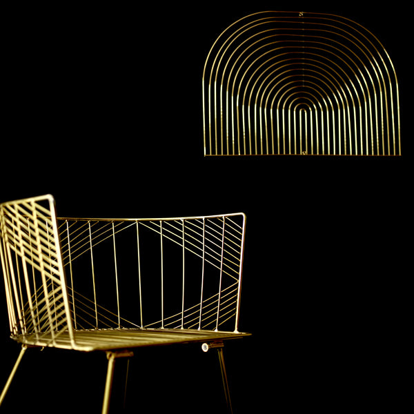 Captain Chair by Bend, showing captain chair with art piece in live shot.