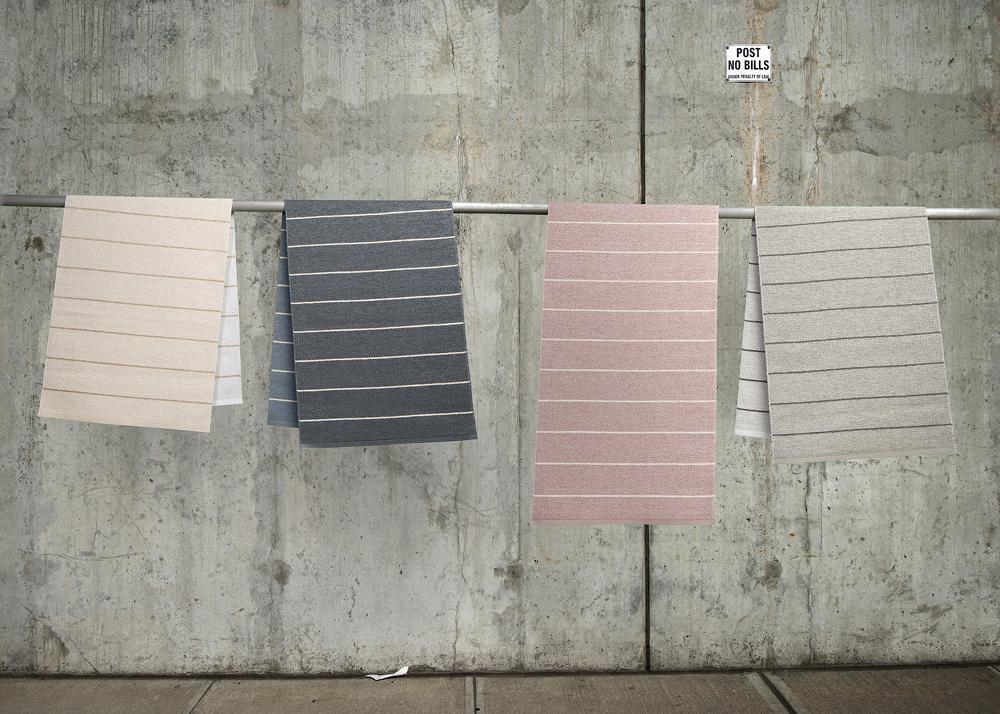 Carl Linen Rug by pappelina, showing carl linen rug in multiple colors.