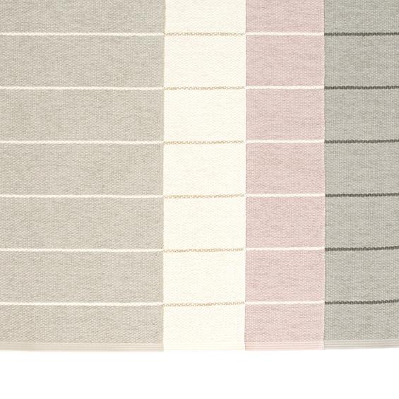 Carl Linen Rug by pappelina, showing carl linen rug in multiple colors.