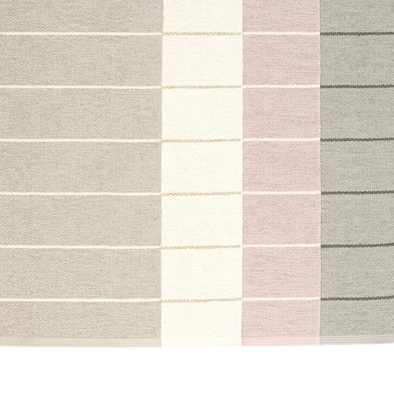 Carl Pale Rose Rug by Pappelina by Pappelina, showing carl pale rose rug in multiple colors.