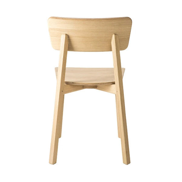 Casale Dining Chair by Ethnicraft, showing back view of dining chair in varnished natural oak finish.