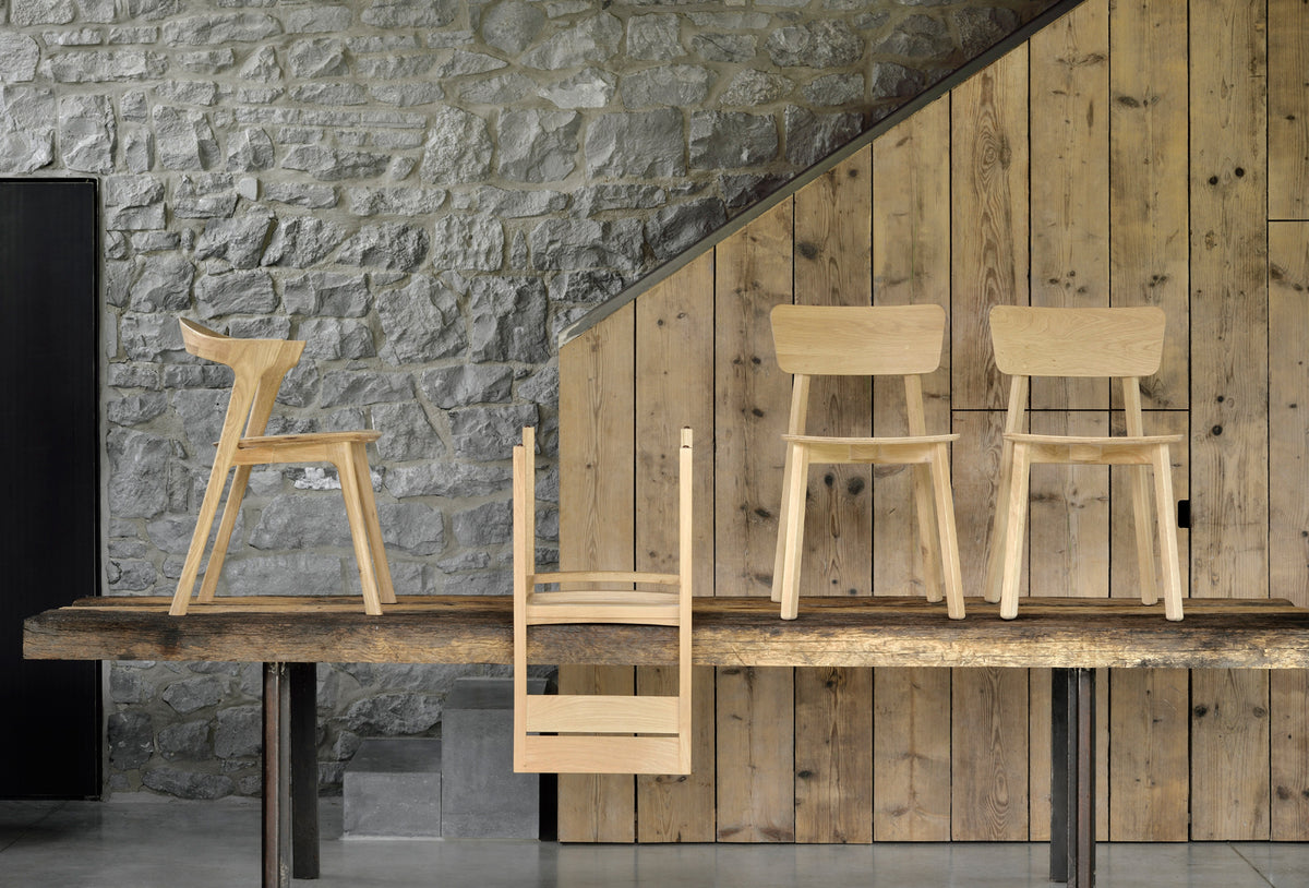 Casale Dining Chair by Ethnicraft, showing of dining chairs with dining table in the live shot.