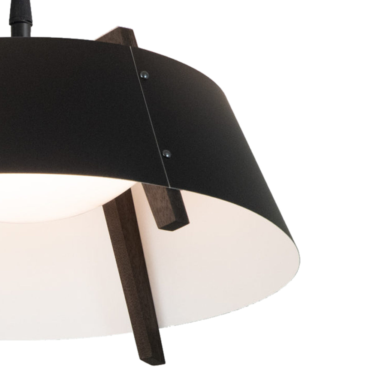 Casia Pendant by Cerno, showing detail view of casia pendant in matte black/white interior shade + dark stained walnut wood.