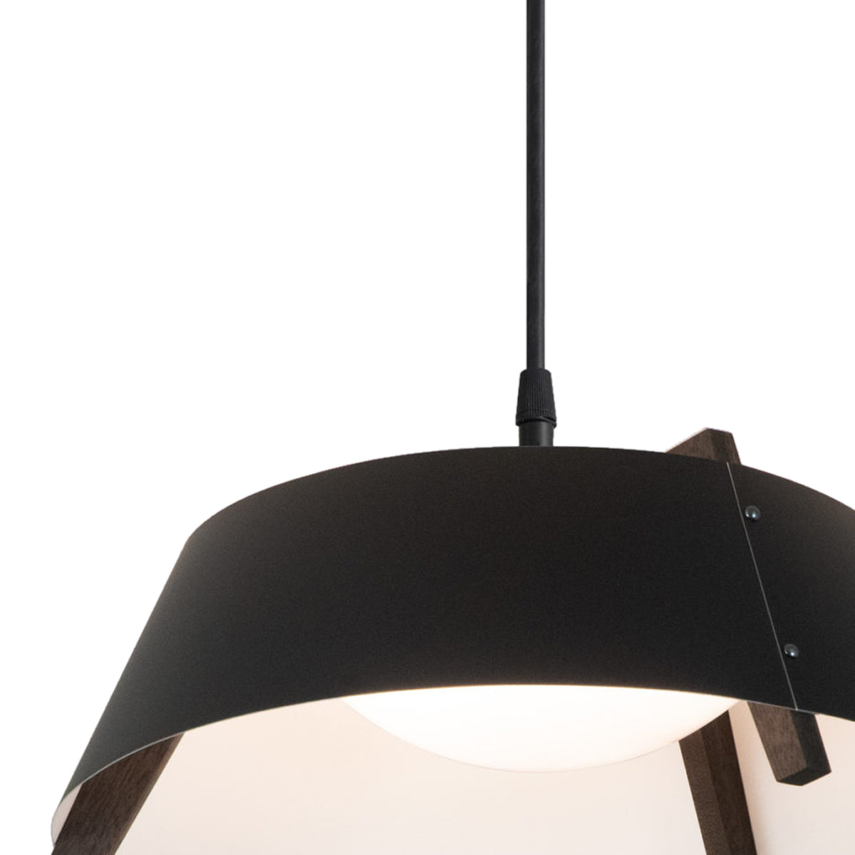 Casia Pendant by Cerno, showing detail view of casia pendant in matte black/white interior shade + dark stained walnut wood.
