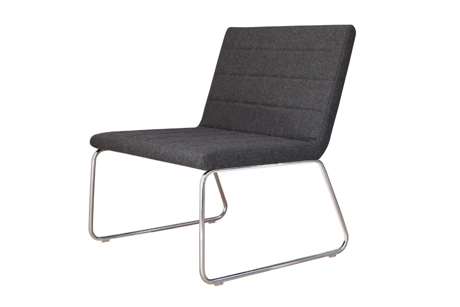 Chelsea Slide Chair by SohoConcept, showing angle view of the chair in dark grey camira wool.