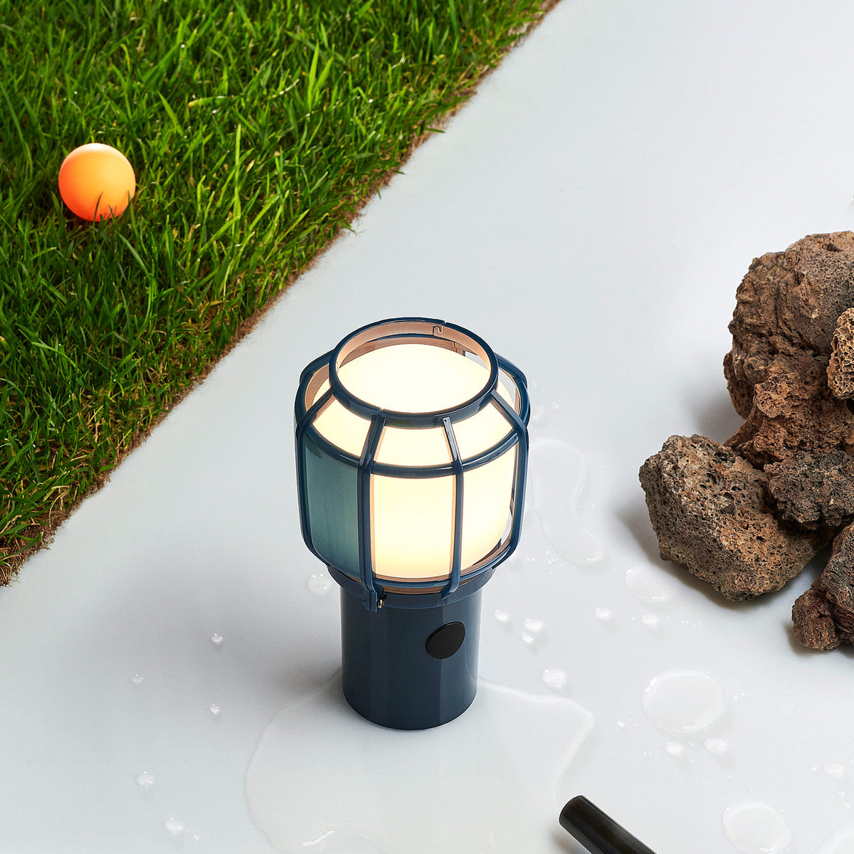 Chispa Portable Lamp by Marset, showing chispa portable lamp in live shot.