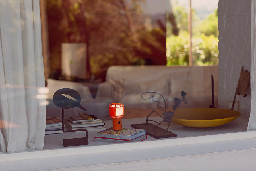 Chispa Portable Lamp by Marset, showing chispa portable lamp in live shot.