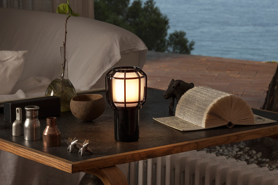 Chispa Portable Lamp by Marset, showing chispa portable lamp in live shot.