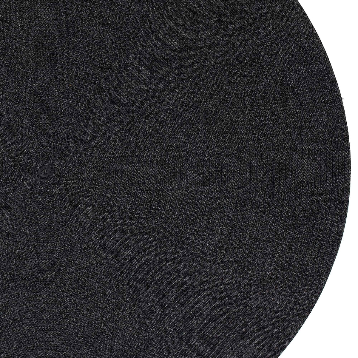 Circle Rug by Cane-Line, showing closeup view of circle rug in dark grey soft rope.