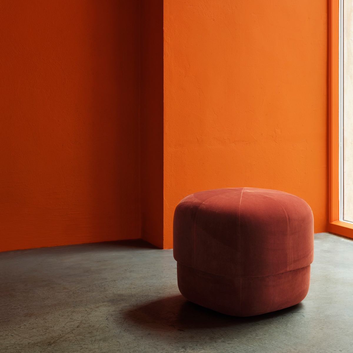 Circus Velour Pouf by Normann Copenhagen, showing circus velour pouf in live shot.