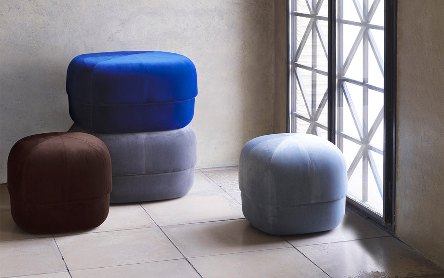 Circus Velour Pouf by Normann Copenhagen, showing circus velour poufs in live shot.