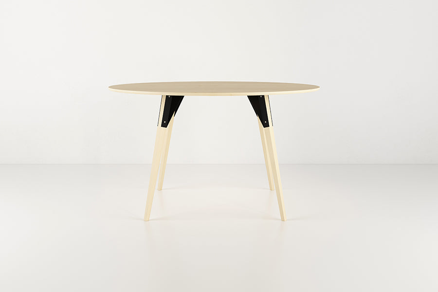 Clarke Dining Table by Tronk Design, showing clarke dining table in live shot.
