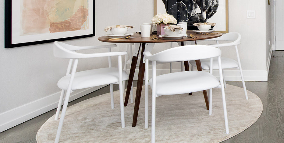 Clarke Dining Table by Tronk Design, showing clarke dining table in live shot.