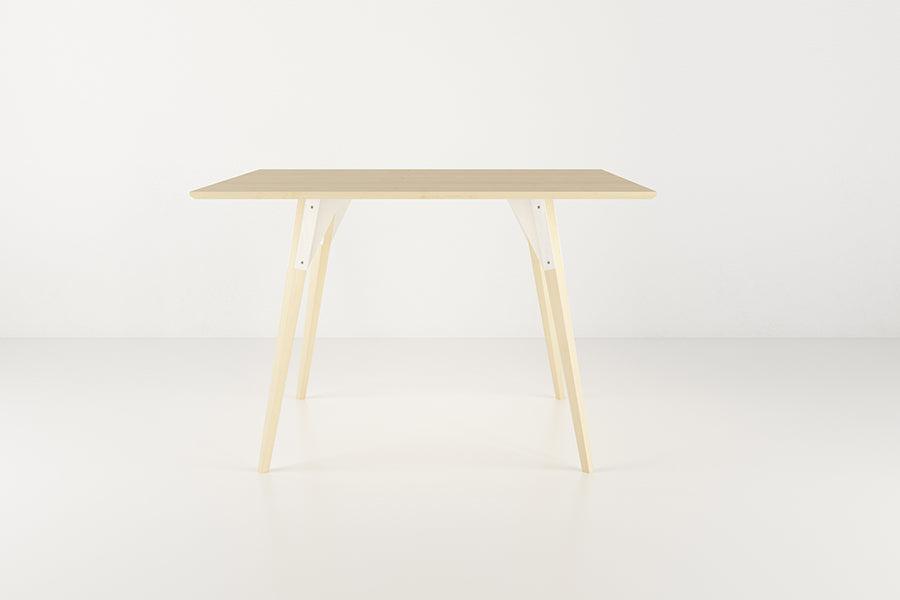 Clarke Dining Table by Tronk Design, showing clarke dining table in live shot.