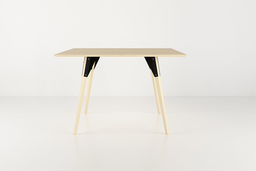 Clarke Dining Table by Tronk Design, showing clarke dining table in live shot.