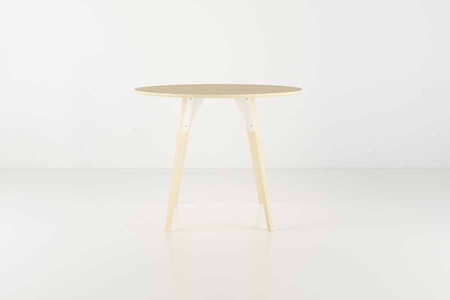 Clarke Dining Table by Tronk Design, showing clarke dining table in live shot.
