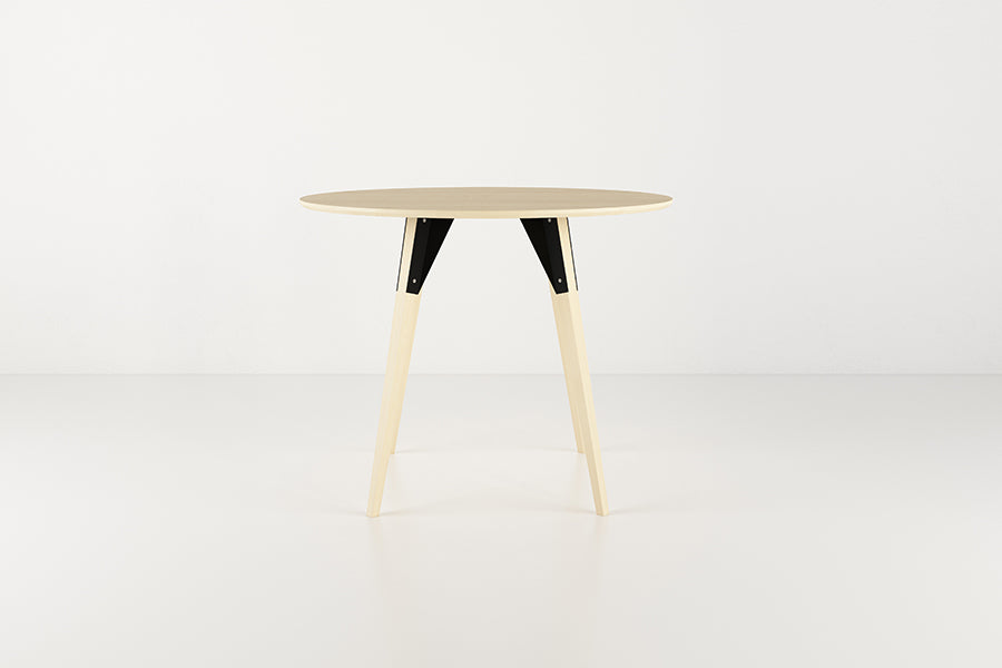 Clarke Dining Table by Tronk Design, showing clarke dining table in live shot.