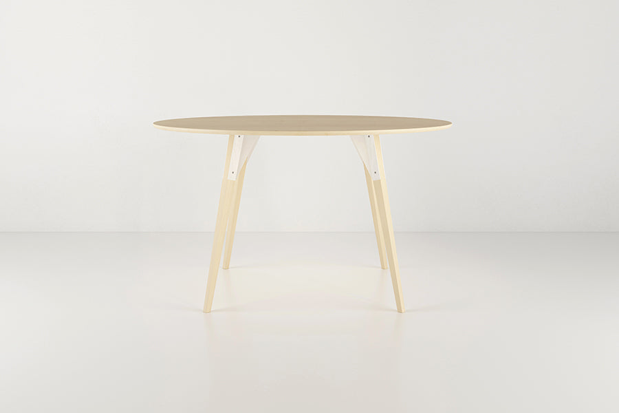Clarke Dining Table by Tronk Design, showing clarke dining table in live shot.