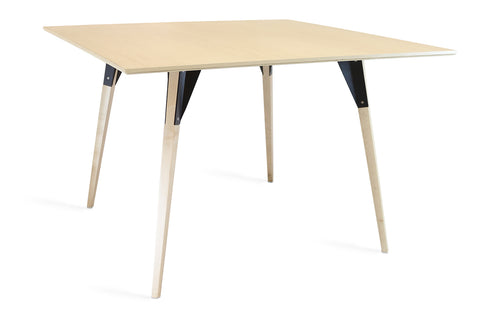 Clarke Dining Table by Tronk Design - Small Rectangle, Maple Wood Finish, Black Powder Coated Steel.