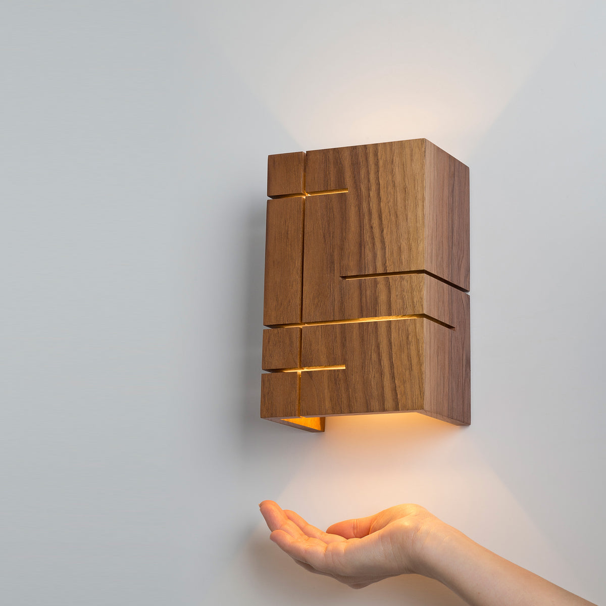Claudo LED Sconce by Cerno, showing angle view of claudo led sconce in live shot.