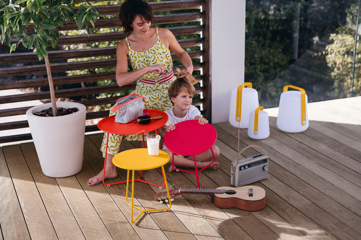 Cocotte Small Side Table by Fermob, showing top view of small side table in the live shot.
