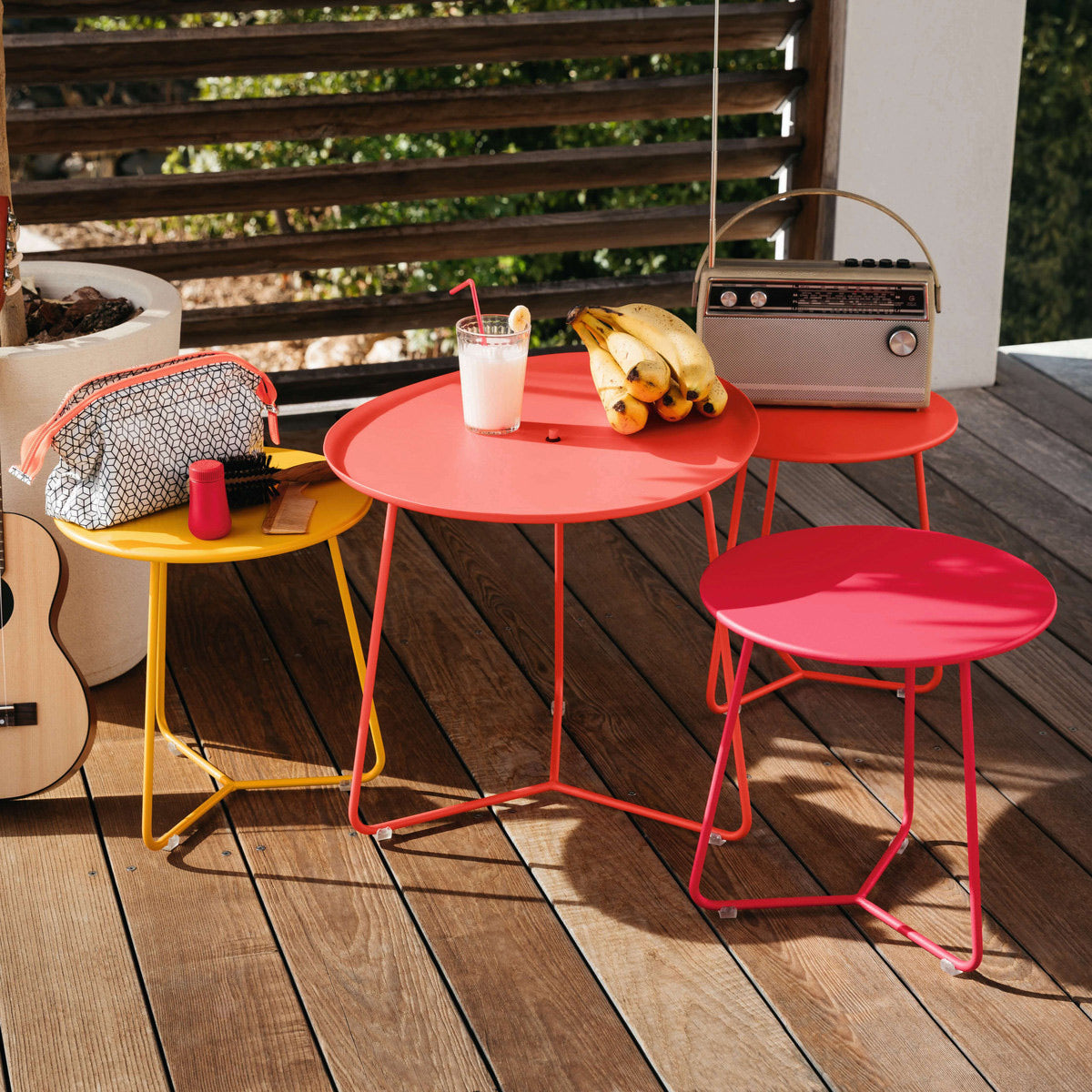 Cocotte Small Side Table by Fermob, showing front view of small side table in the live shot.