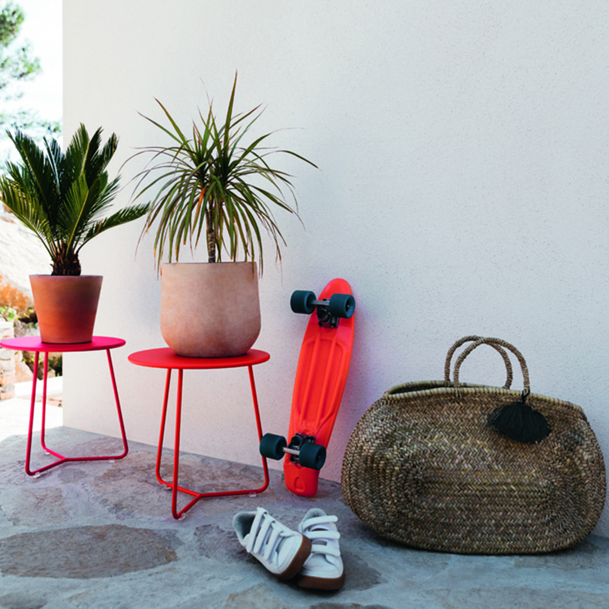Cocotte Small Side Table by Fermob, showing front view of small side table in the live shot.