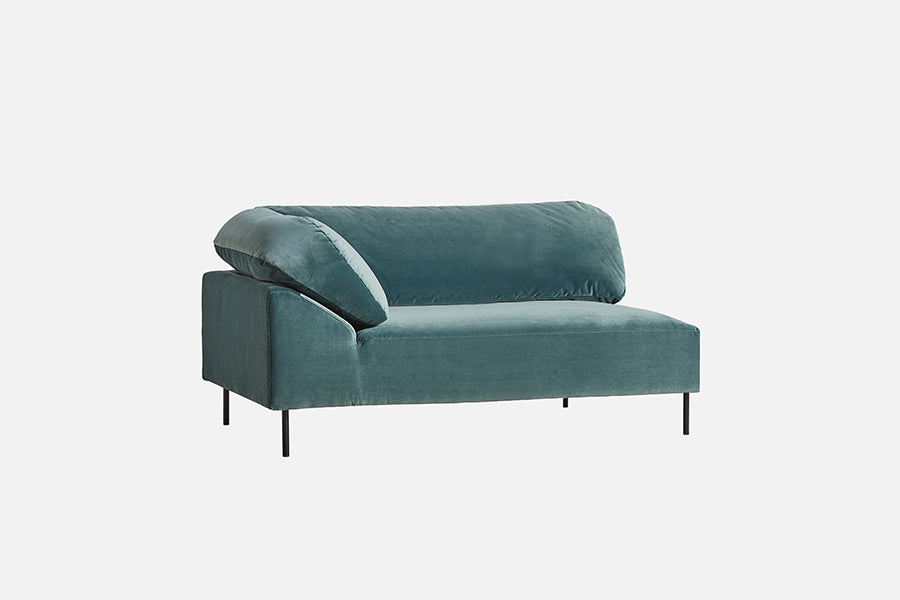 Collar Open End 1 Arm Sofa by Woud, showing angle view of collar open end 1 arm sofas in studio shot.