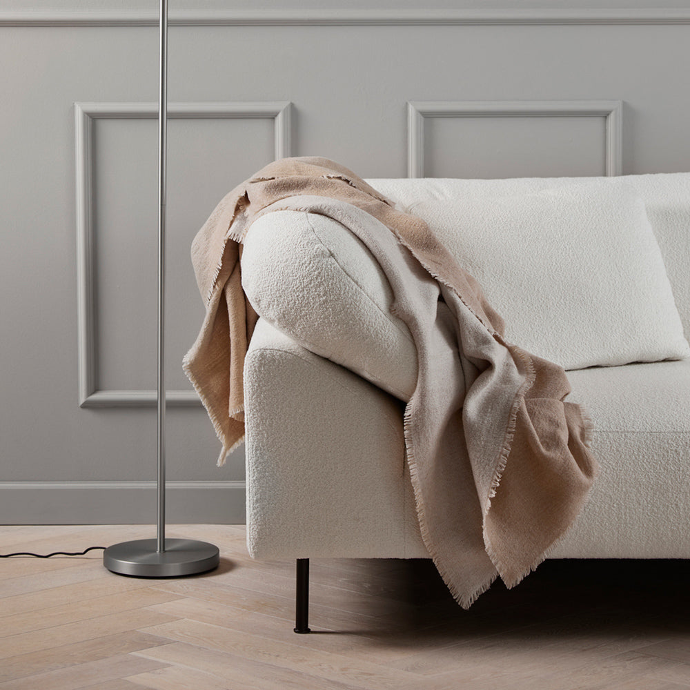 Collar Open End 1 Arm Sofa by Woud, showing closeup view of collar open end 1 arm sofa in live shot.