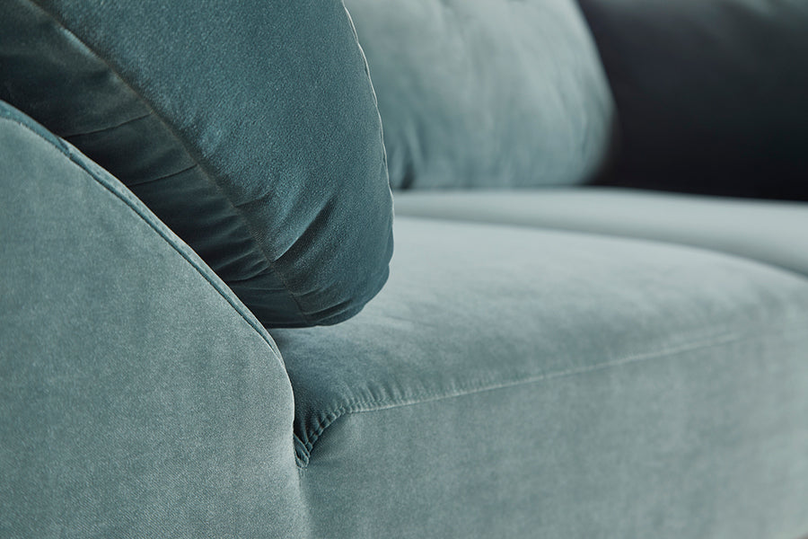 Collar Open End 1 Arm Sofa by Woud, showing closeup view of collar open end 1 arm sofa in live shot.