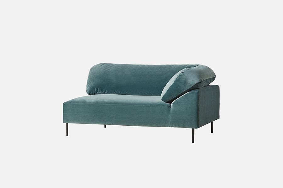 Collar Open End 1 Arm Sofa by Woud, showing angle view of collar open end 1 arm sofas in studio shot.