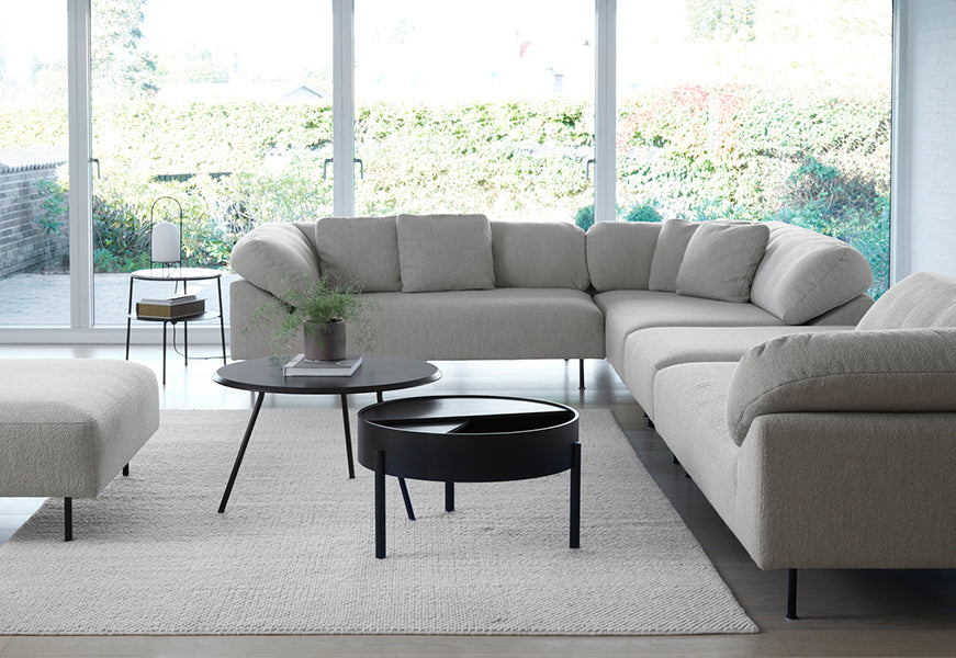 Collar Open End 1 Arm Sofa by Woud, showing collar open end 1 arm sofas in live shot.
