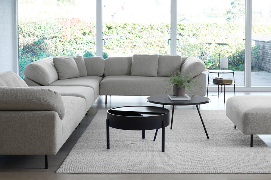 Collar Ottoman by Woud, showing closeup view of collar ottoman in live shot.