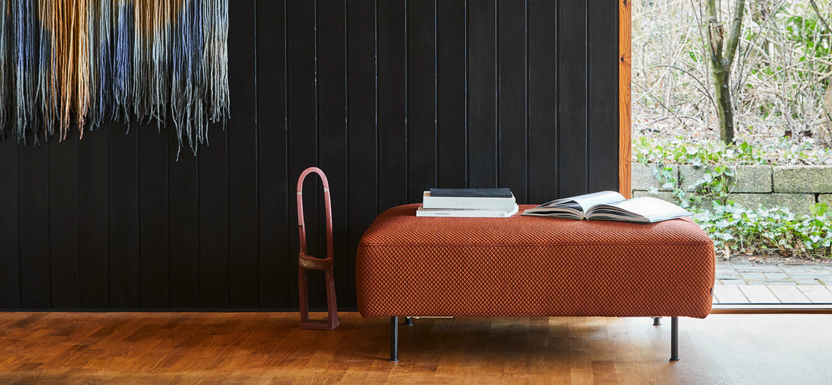 Collar Ottoman by Woud, showing collar ottoman in live shot.