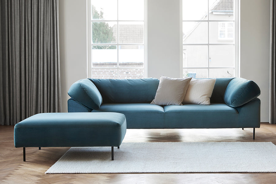 Collar Ottoman by Woud, showing collar ottoman in live shot.
