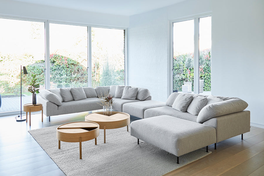 Collar Ottoman by Woud, showing collar ottoman in live shot.